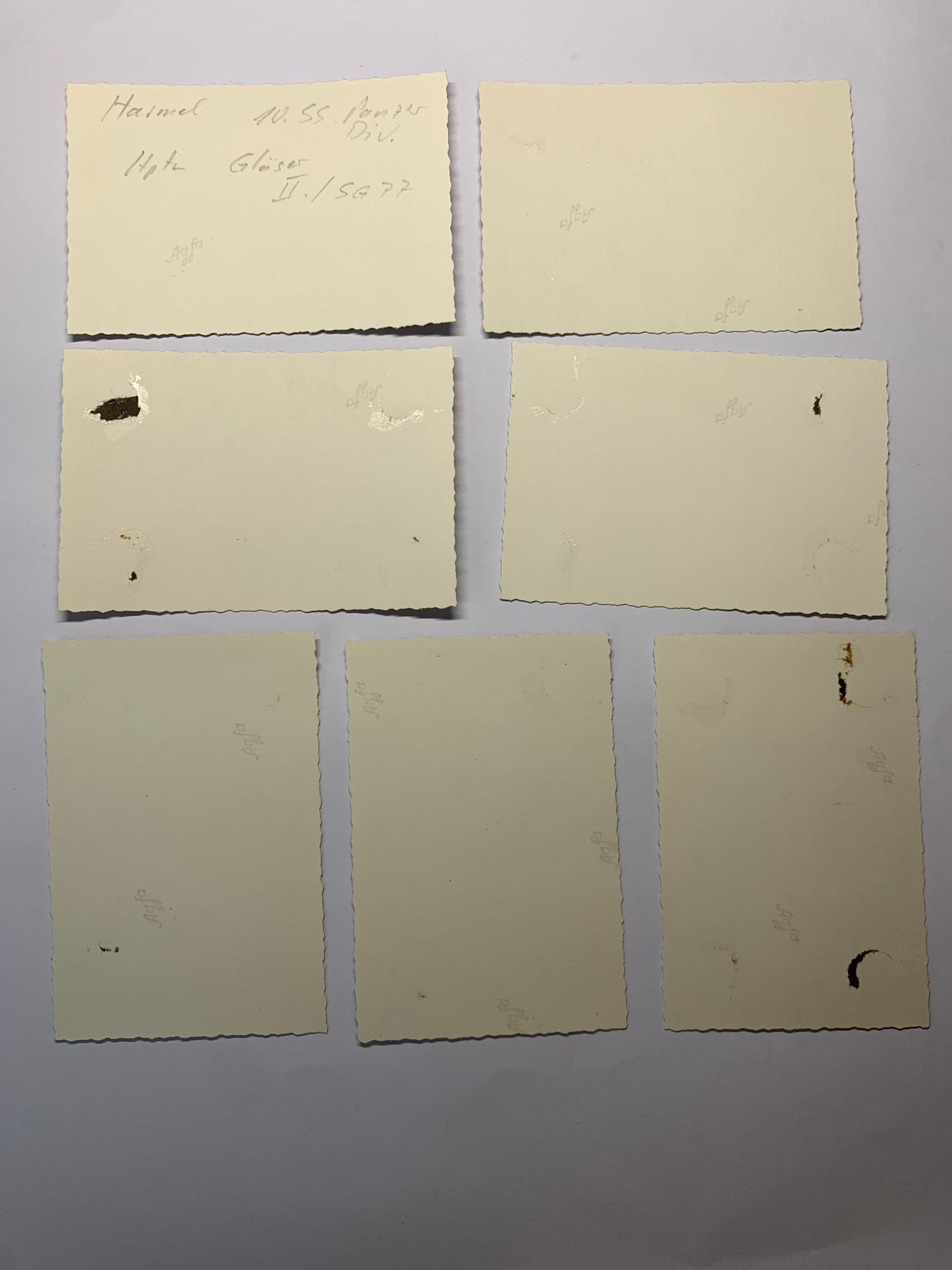 Konvolut Ritterkreuzträger Heinz Harmel, 10.SS Panzerdivision, Unterschriftenkarte, Archivfotos mit Harmel und Hitler, signiertes Buch ,,Dran Drauf und durch“, Grabstein von Harmel, Kopien von Zeitungsartikel mit Harmel, alles aus der Nachkriegszeit